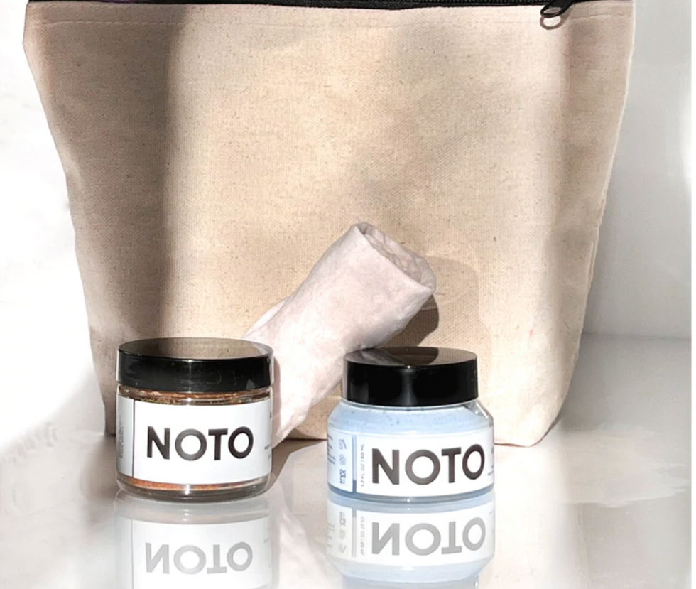 two jars of skincare products by noto botanics.