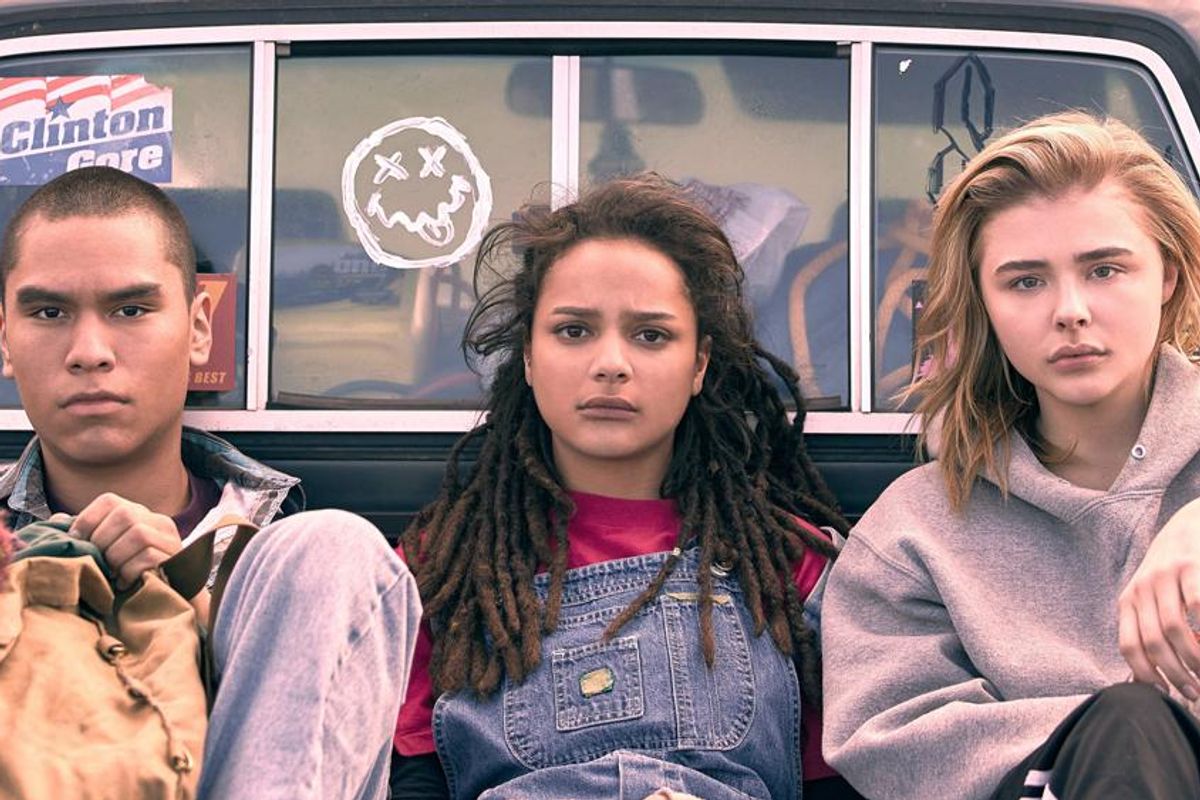 cast of The Miseducation of Cameron Post sitting in the bed of a pickup truck.