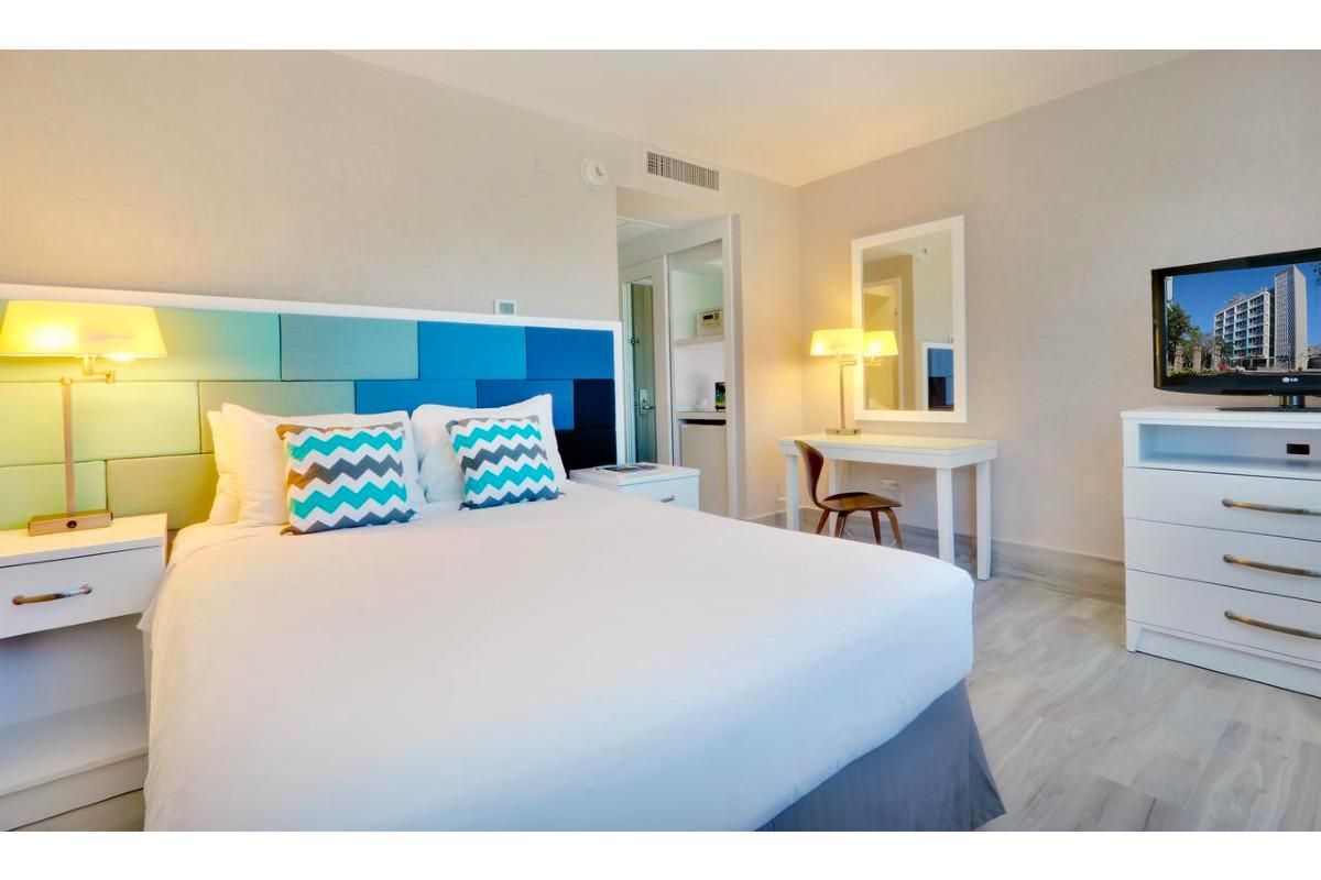 comfort king bed at the wave hotel condado in puerto rico.