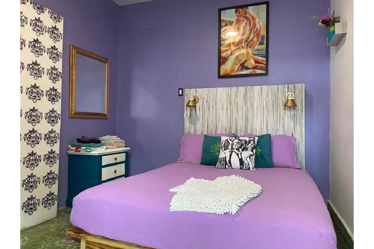 the purple queen room at Coqui del Mar.