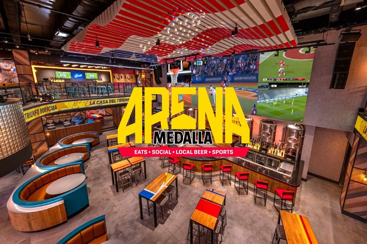 ariel view of arena medalla seating area and bar.
