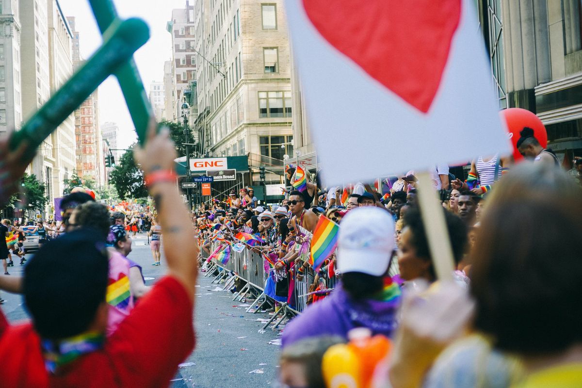 crowds of people celebrating the Pride parade in NYC.