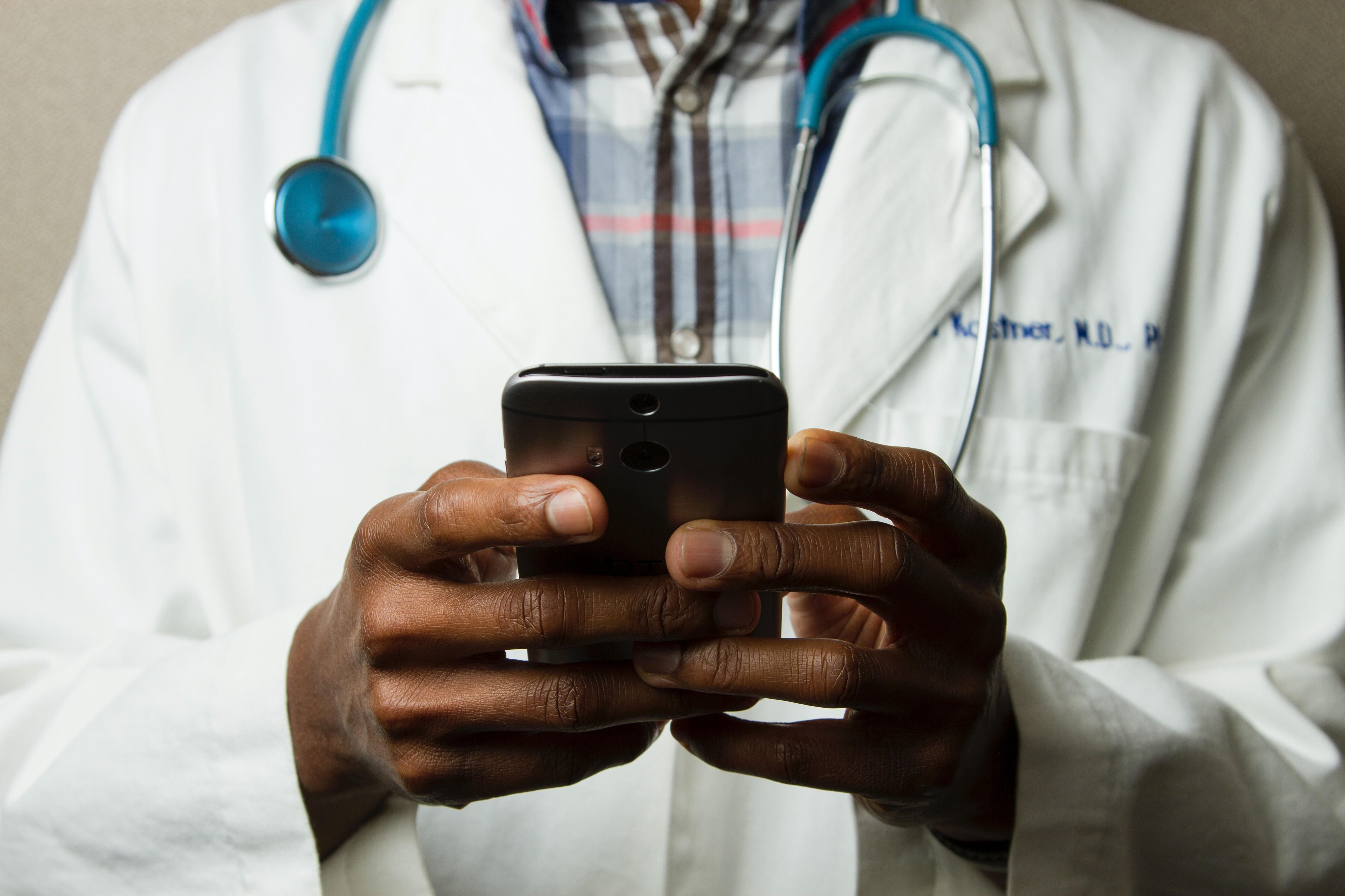 doctor holding a smartphone