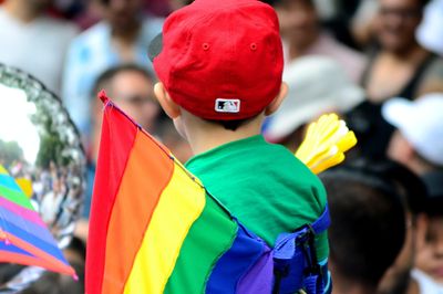 boy with rainbow flag
