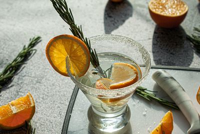 sliced orange on a martini glass.